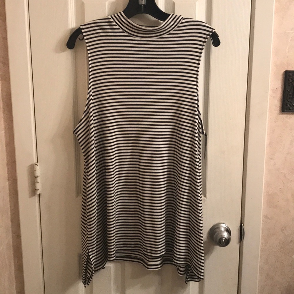 Black and white striped shirt. Sleeveless size L